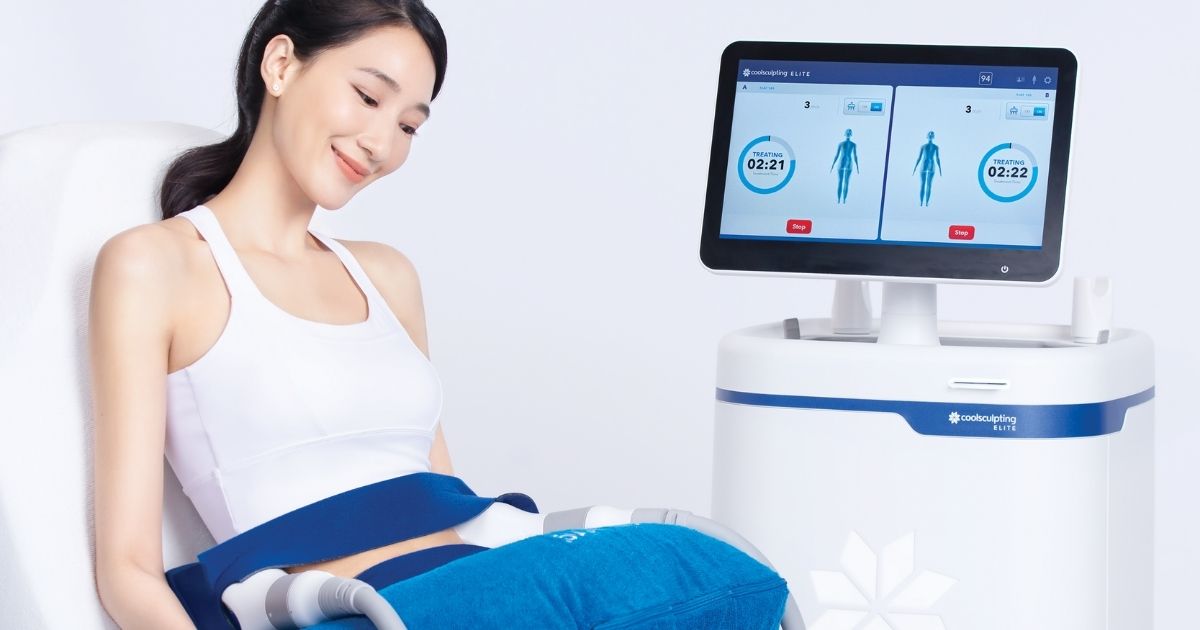 Woman undergoing a CoolSculpting Elite body contouring treatment in a medical spa.